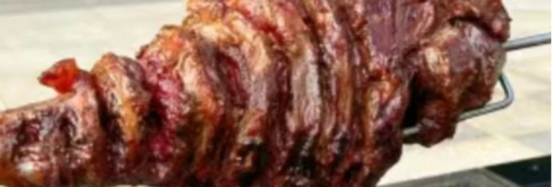 三姐瓦喇果木炭烤羊腿